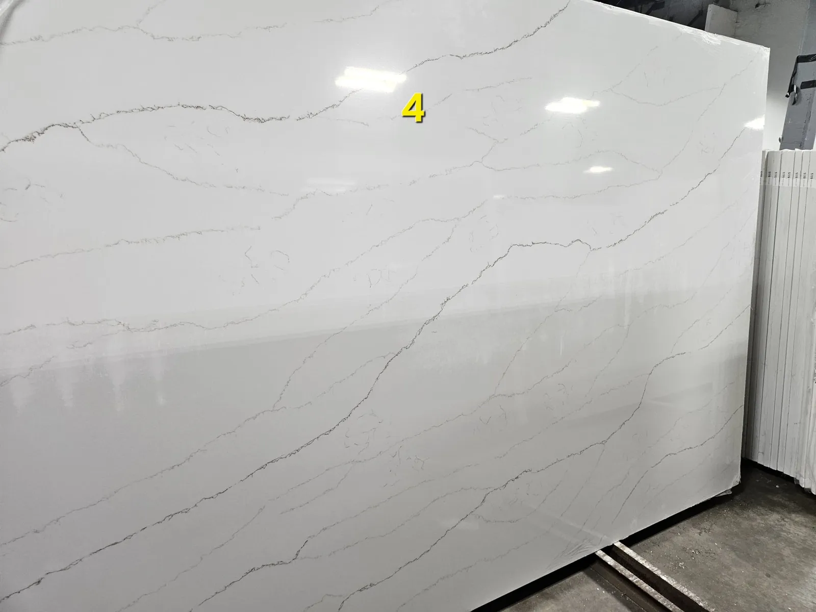 Selecting a full quartz slab at the stone yard